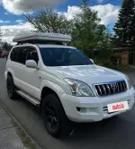 Toyota Land Cruiser 120 með topptjaldi